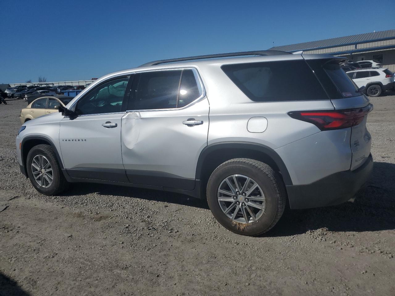 2022 Chevrolet Traverse VIN 1GNERGKW1NJ166154 Copart auction photo, side / minor dent/scratches damage thumbnail 2