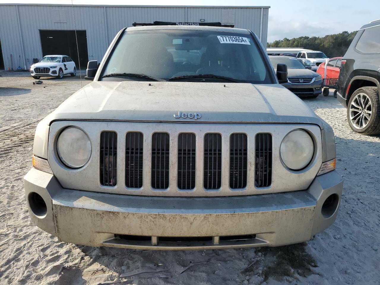 2010 Jeep Liberty (Patriot) VIN 1J4NT2GB4AD503020 Copart auction photo, minor dent/scratches damage thumbnail 5