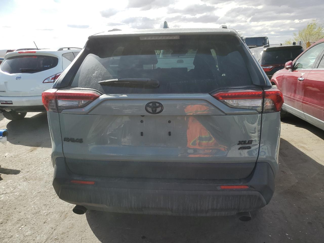 2021 Toyota RAV 4 VIN JTMP1RFV2MD077101 Copart auction photo, front end / side damage thumbnail 6