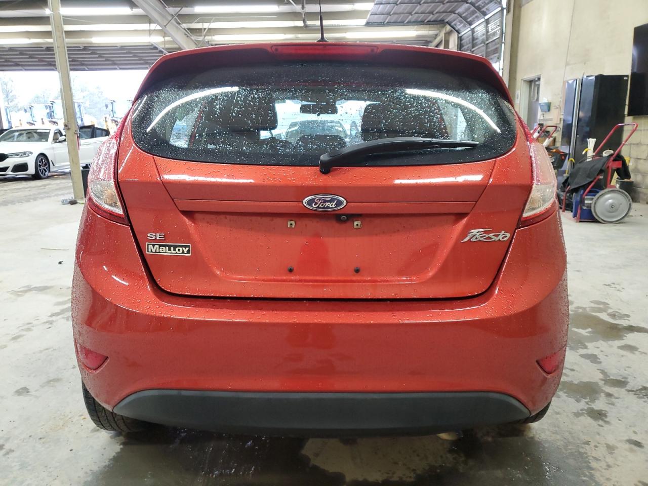 2019 Ford Fiesta VIN 3FADP4EJ2KM119549 Copart auction photo, front end / side damage thumbnail 6