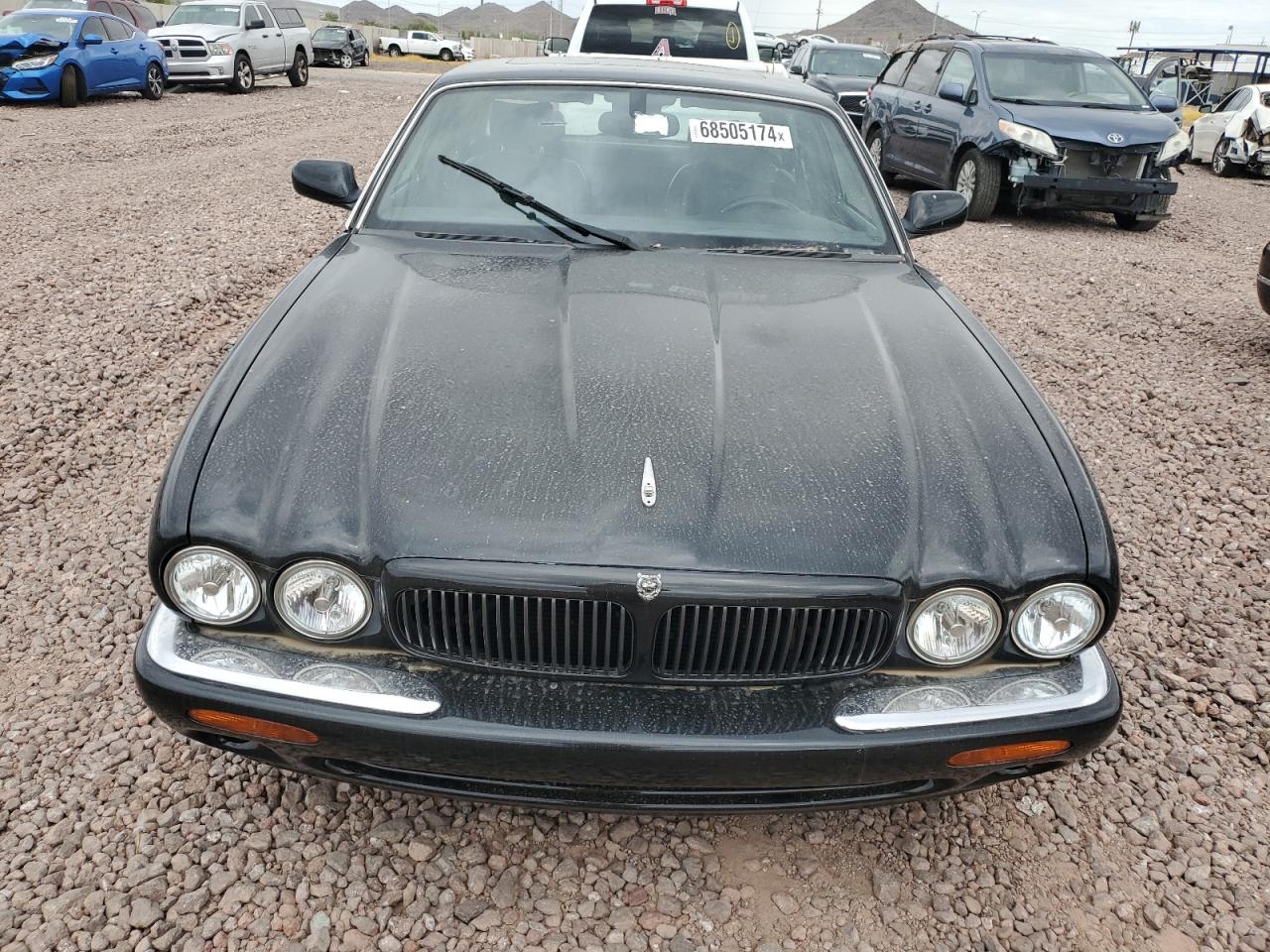 2002 Jaguar XJ VIN SAJDA12C82LF42173 Copart auction photo, minor dent/scratches damage thumbnail 5