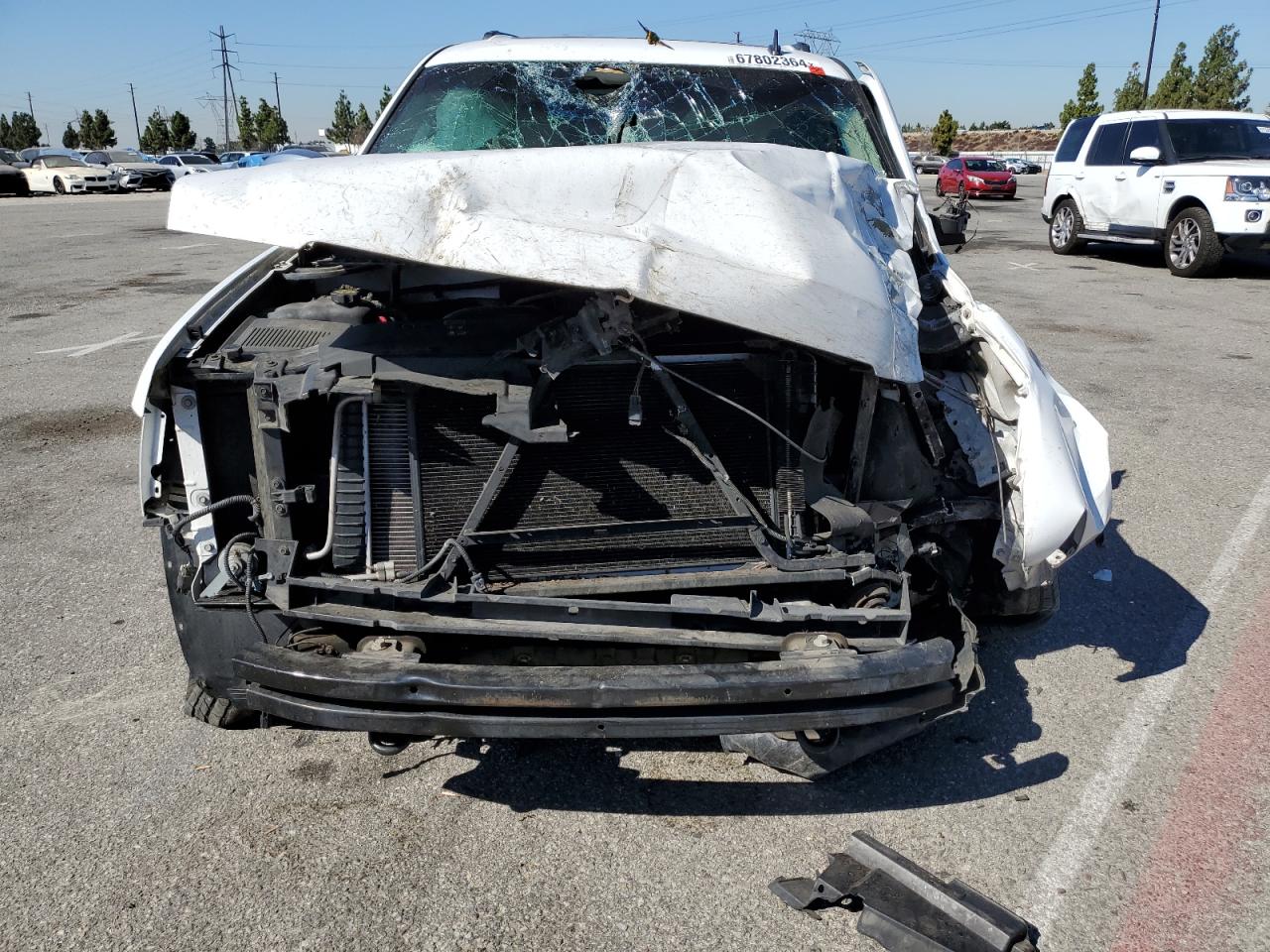 2012 Chevrolet Suburban VIN 1GNSKJE78CR156972 Copart auction photo, all over / undercarriage damage thumbnail 5