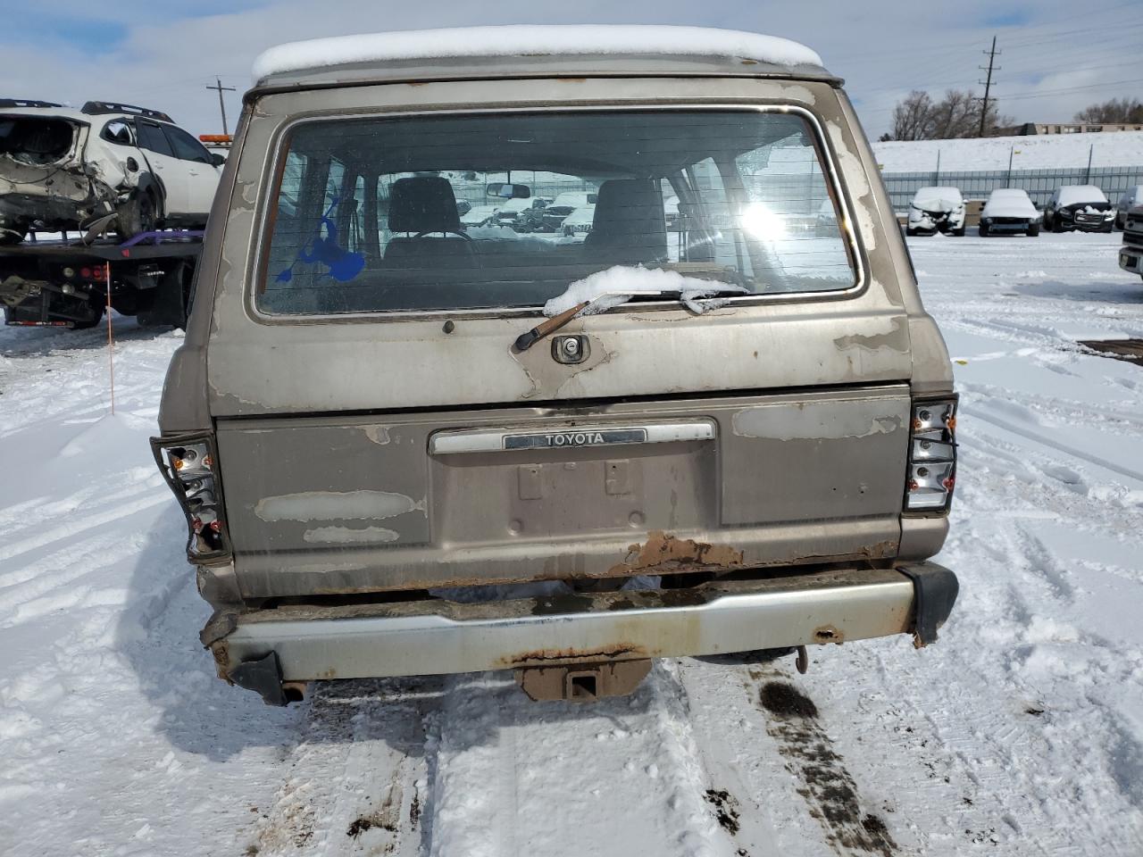1985 Toyota Land Cruiser VIN JT3FJ60G8F1127643 Copart auction photo, all over damage thumbnail 6