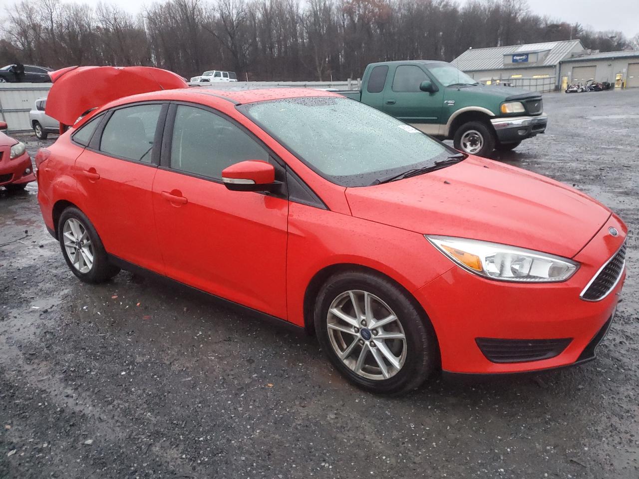 2015 Ford Focus VIN 1FADP3F28FL259811 Copart auction photo, rear end damage thumbnail 4