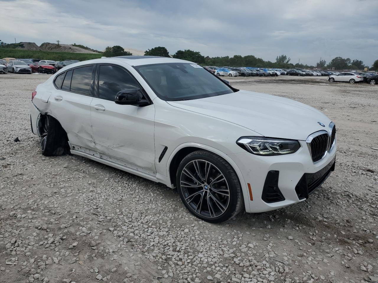 2024 BMW X4 VIN 5UX43DT02R9X54021 Copart auction photo, side / rear end damage thumbnail 4
