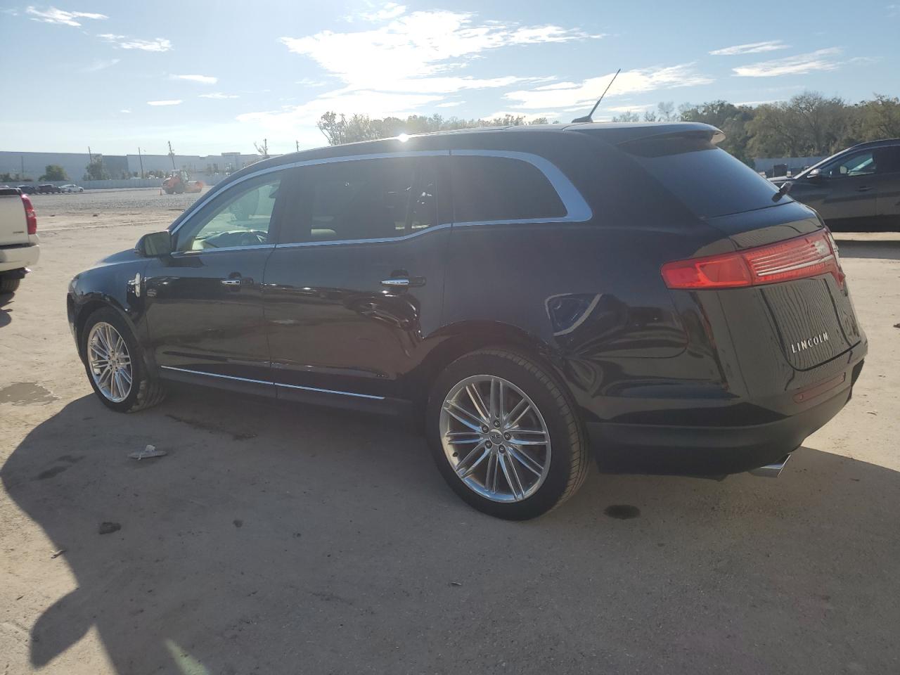2016 Lincoln MKT VIN 2LMHJ5AT9GBL02840 Copart auction photo, minor dent/scratches damage thumbnail 2