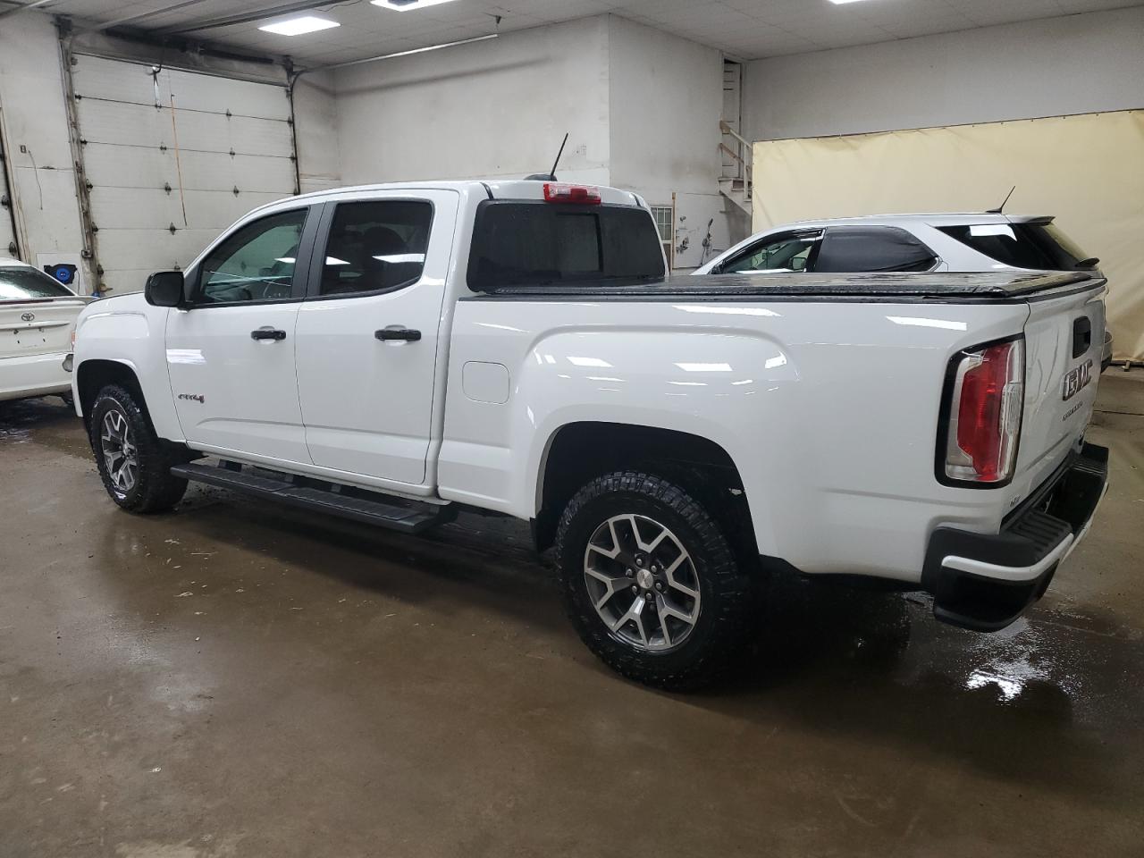 2022 GMC Canyon VIN 1GTG6FEN0N1224911 Copart auction photo, front end / minor dent/scratches damage thumbnail 2