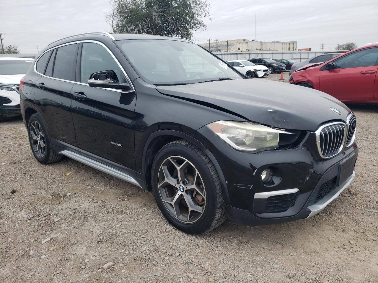 2016 BMW X1 VIN WBXHT3C34G5E56961 Copart auction photo, all over damage thumbnail 4