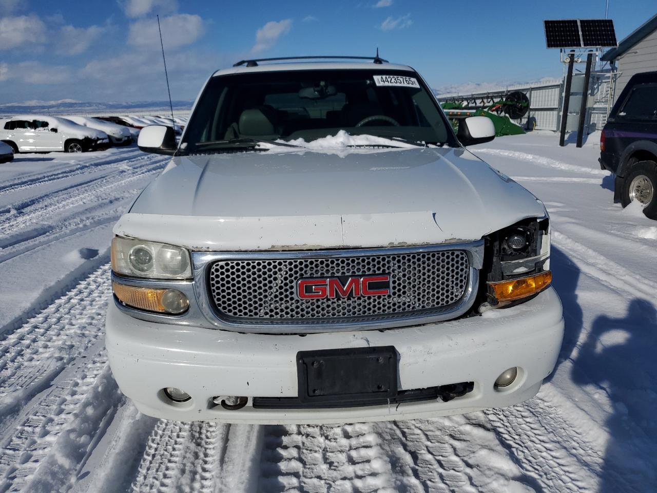 2004 GMC Yukon VIN 1GKFK66UX4J327818 Copart auction photo, front end damage thumbnail 5