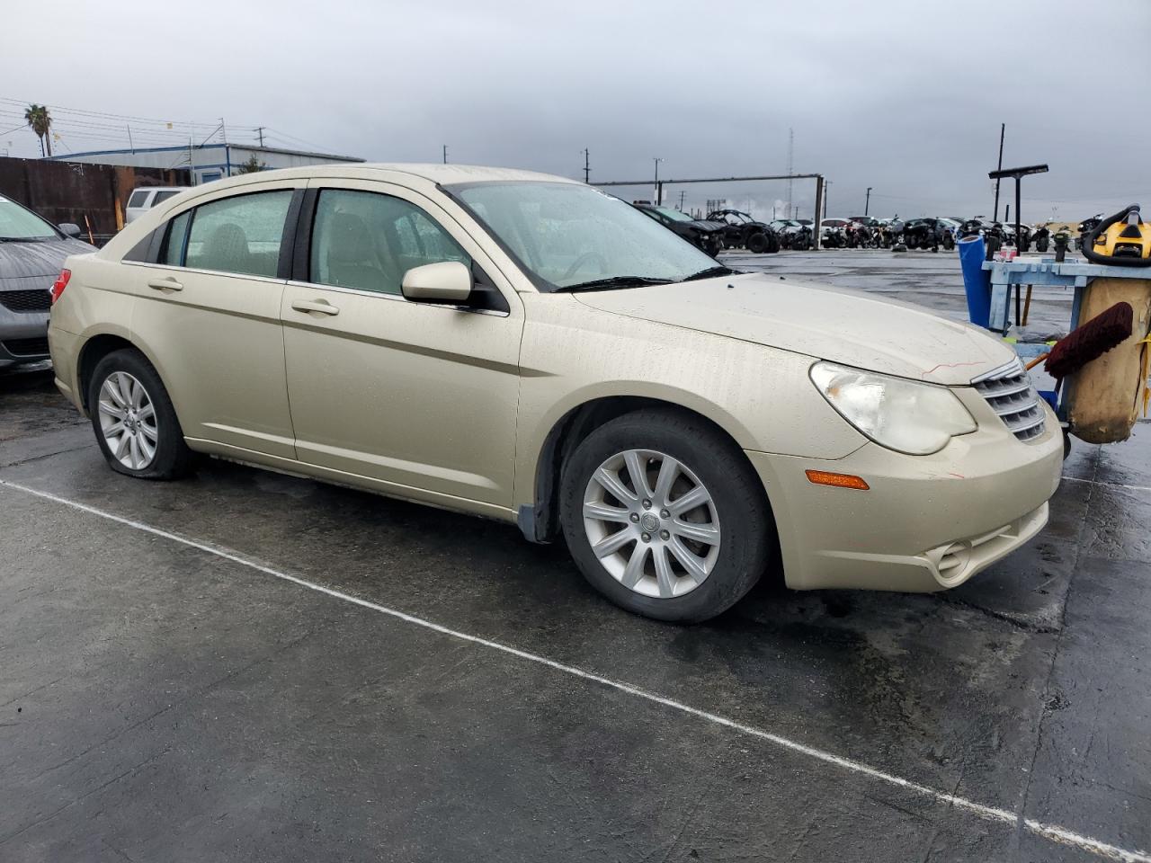 2010 Chrysler Sebring VIN 1C3CC5FB6AN119612 Copart auction photo, vandalism damage thumbnail 4