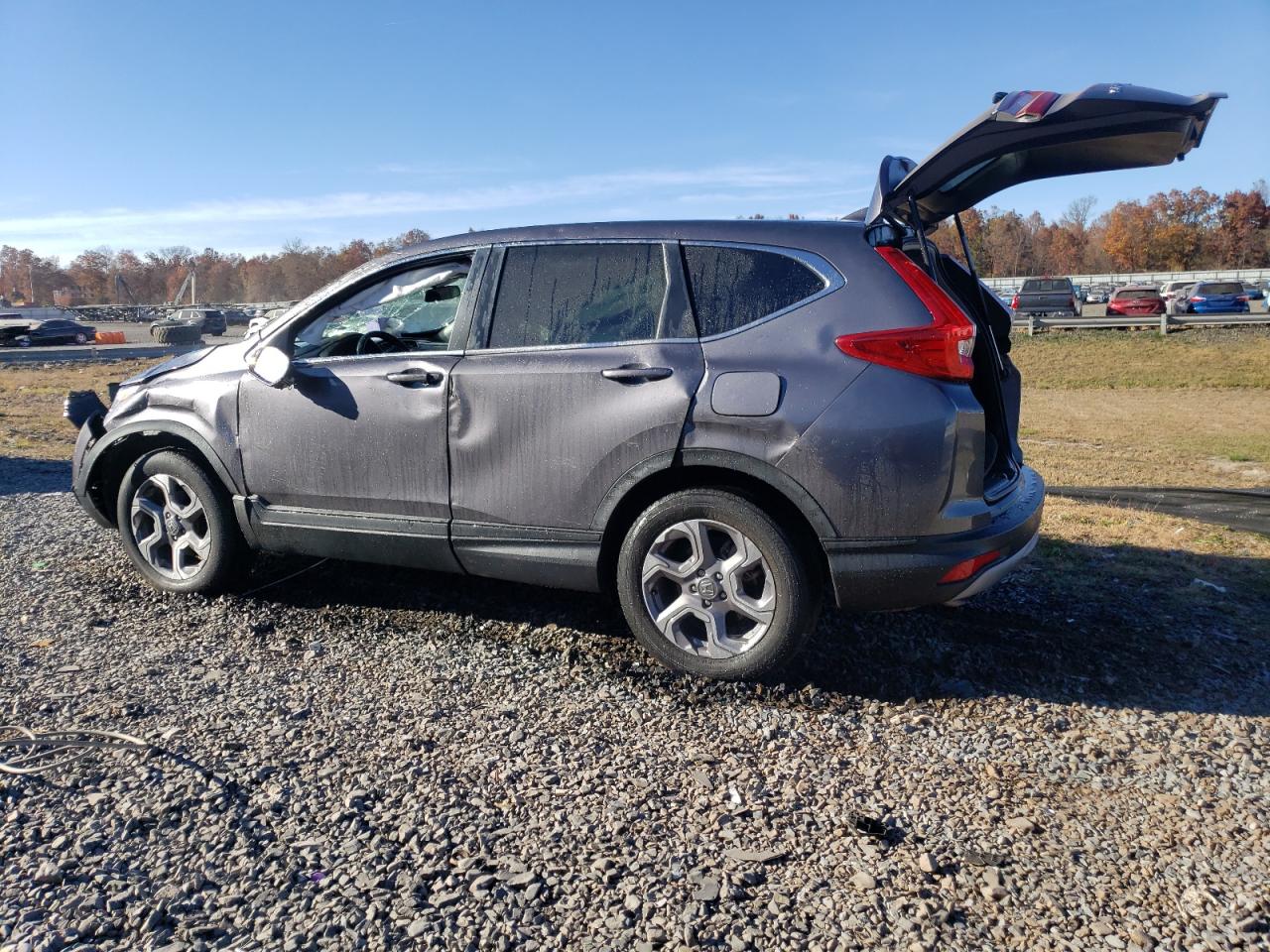 2019 Honda CR-V VIN 7FARW2H57KE049478 Copart auction photo, rollover damage thumbnail 2