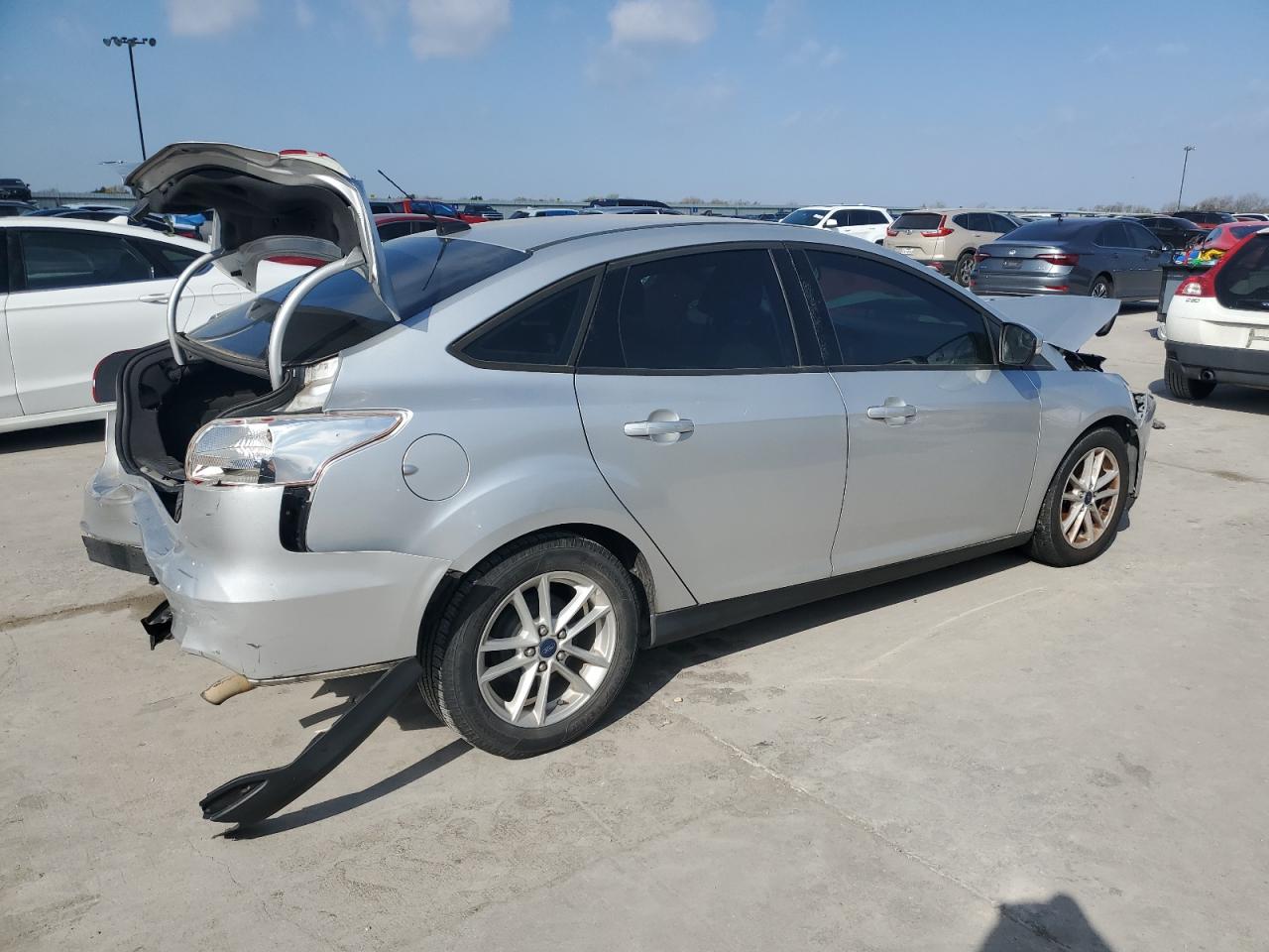 2015 Ford Focus VIN 1FADP3F22FL343803 Copart auction photo, rear end / hail damage thumbnail 3