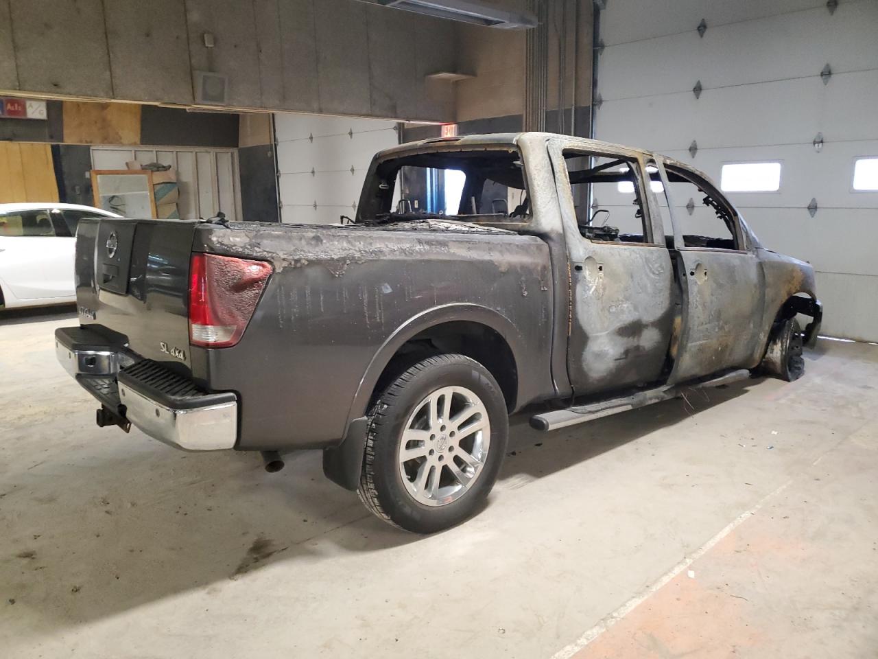 2012 Nissan Titan VIN 1N6AA0EC9CN318756 Copart auction photo, burn damage thumbnail 3