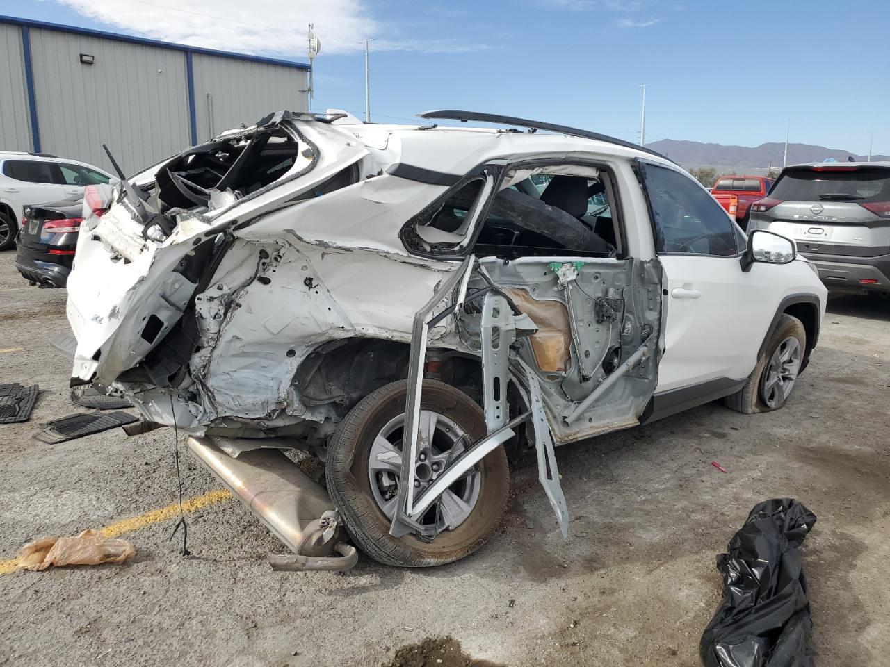 2023 Toyota RAV 4 VIN 2T3W1RFV8PW272400 Copart auction photo, side / rear end damage thumbnail 3