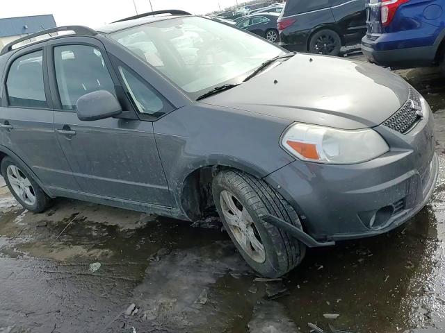 2012 Suzuki SX4 VIN JS2YB5A39C6304910 Copart auction photo, undercarriage / front end damage thumbnail 11