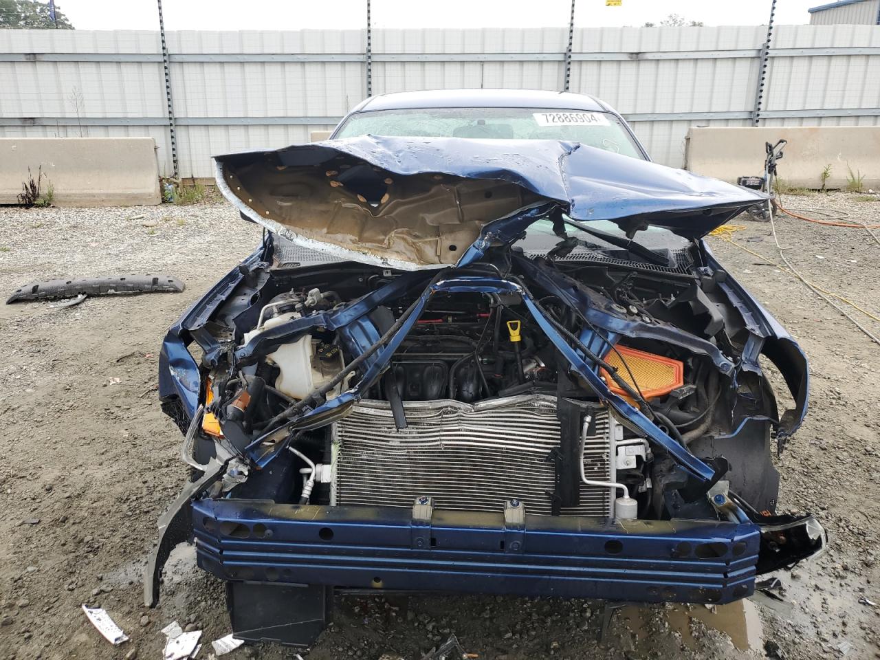 2009 Ford Focus VIN 1FAHP35NX9W131831 Copart auction photo, front end damage thumbnail 5