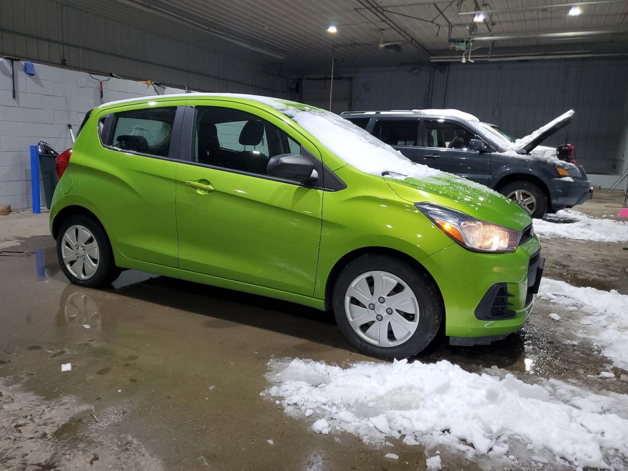 2016 Chevrolet Spark VIN KL8CB6SA7GC576279 Copart auction photo, side / minor dent/scratches damage thumbnail 4