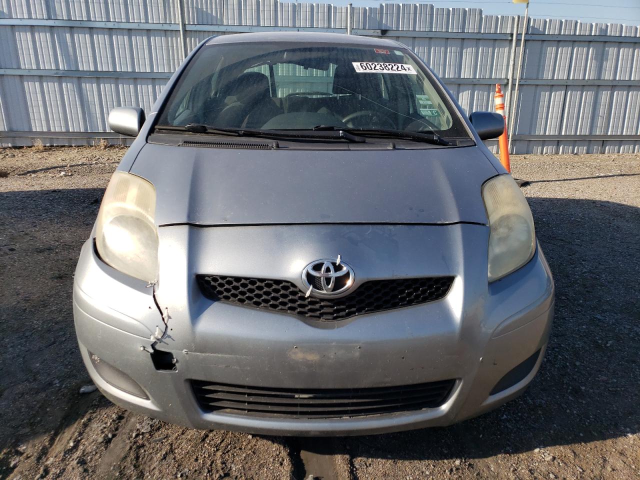 2011 Toyota Yaris VIN JTDKT4K38B5337231 Copart auction photo, front end / hail damage thumbnail 5
