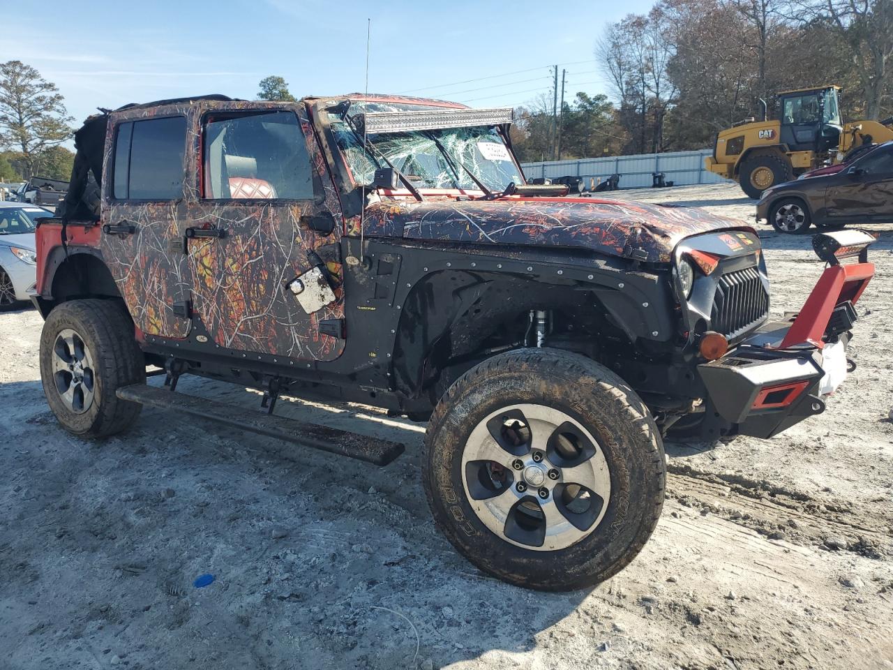 2011 Jeep Wrangler VIN 1J4BZ3H17BL599763 Copart auction photo, all over damage thumbnail 4