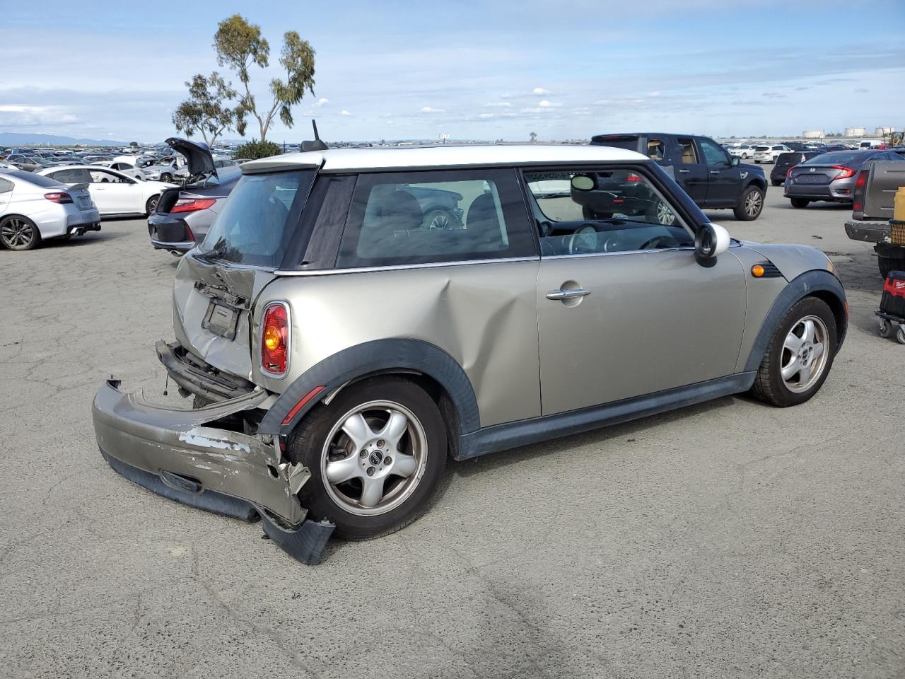 2009 MINI Cooper VIN WMWMF33569TT69401 Copart auction photo, rear end damage thumbnail 3