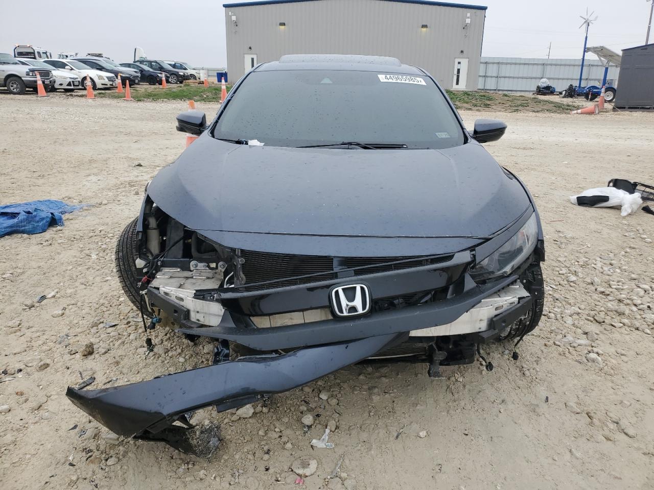 2020 Honda Civic VIN 19XFC1F74LE015365 Copart auction photo, front end / side damage thumbnail 5