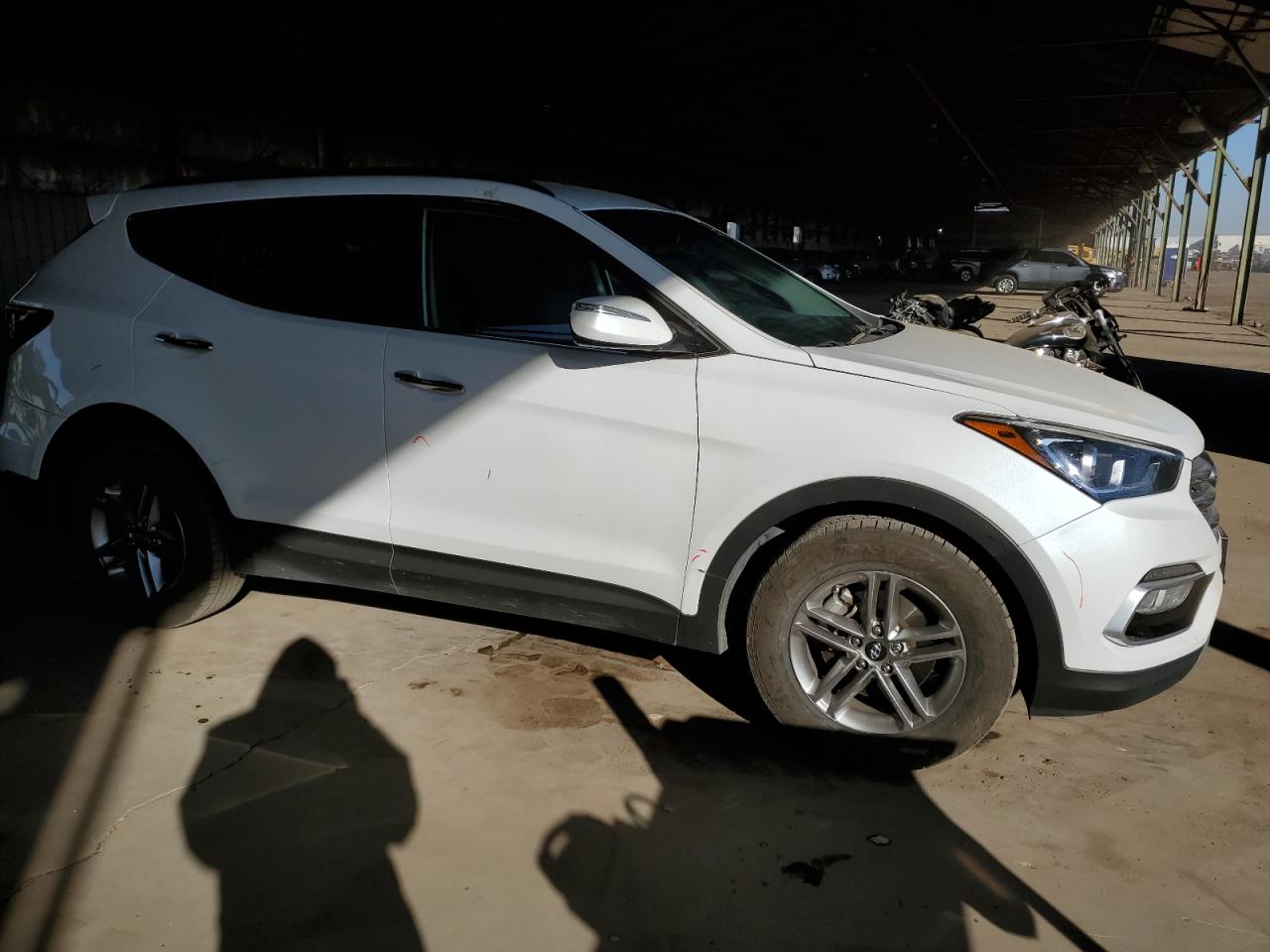 2018 Hyundai Santa Fe VIN 5XYZU3LB4JG562277 Copart auction photo, front end / side damage thumbnail 4