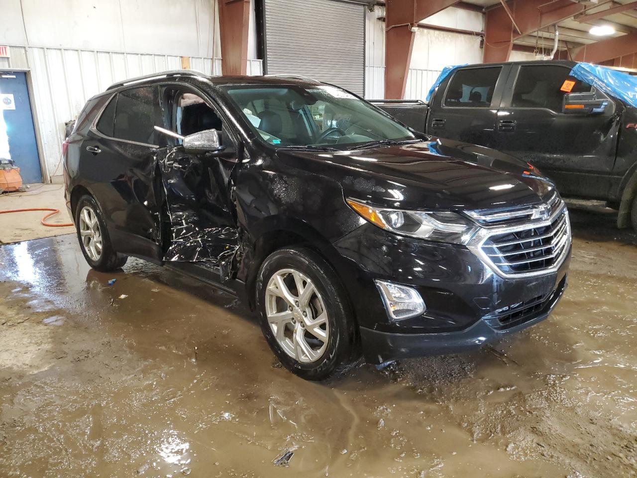 2018 Chevrolet Equinox VIN 3GNAXXEU4JL242810 Copart auction photo, side damage thumbnail 4