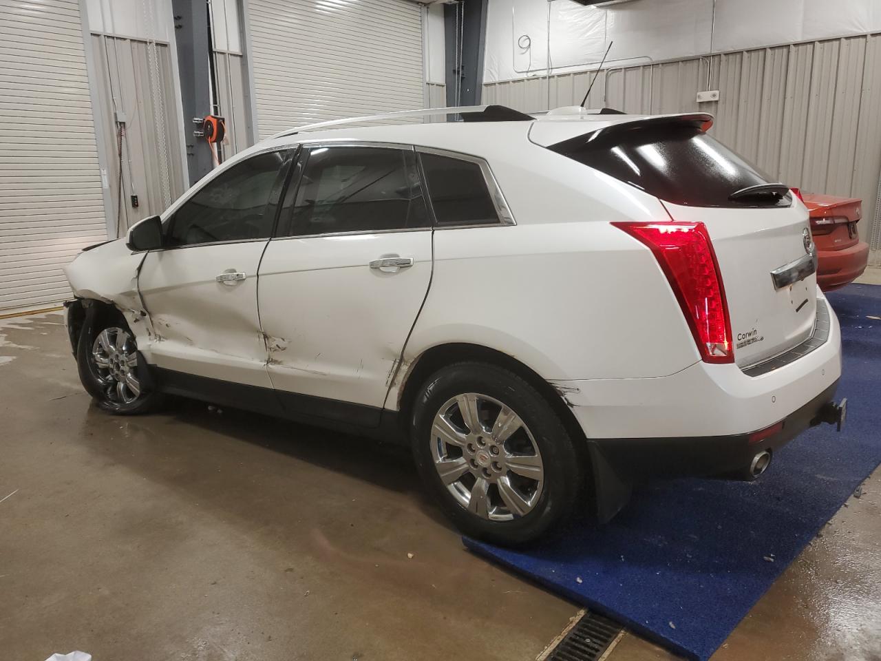 2016 Cadillac SRX VIN 3GYFNEE35GS578314 Copart auction photo, front end / side damage thumbnail 2