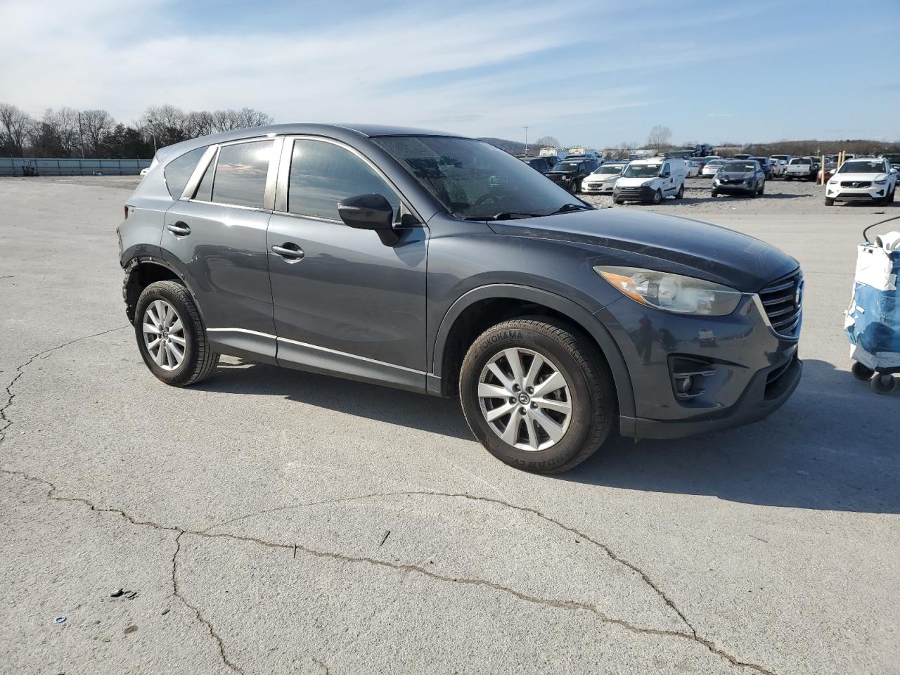 2016 Mazda CX-5 VIN JM3KE2CY0G0761183 Copart auction photo, rear end damage thumbnail 4
