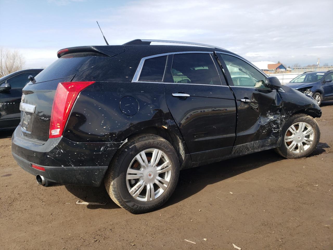 2011 Cadillac SRX VIN 3GYFNDEYXBS673689 Copart auction photo, front end / side damage thumbnail 3