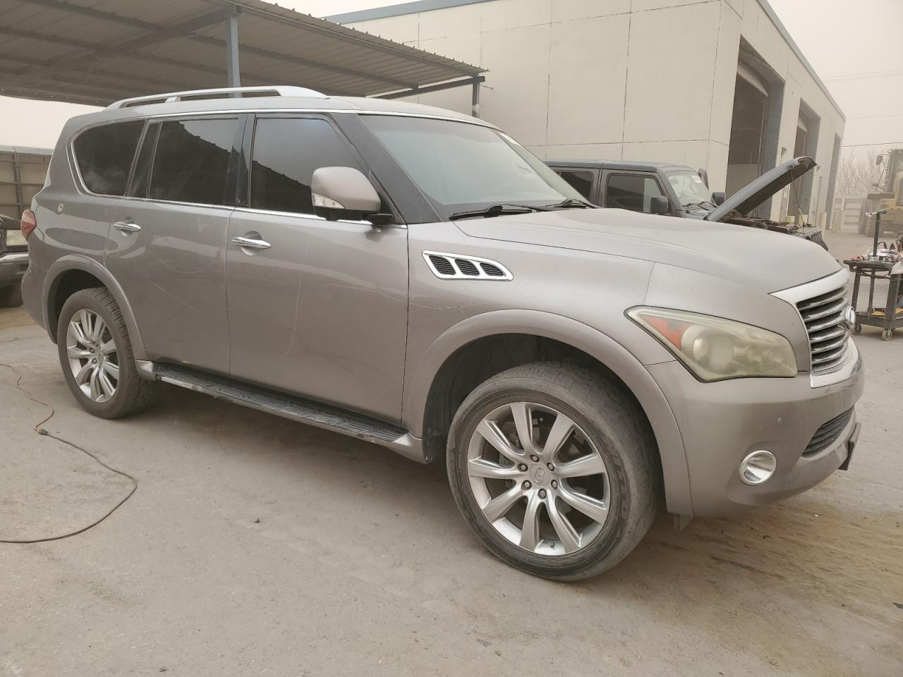 2011 Infiniti QX56 VIN JN8AZ2NF0B9503307 Copart auction photo, side / vandalism damage thumbnail 4