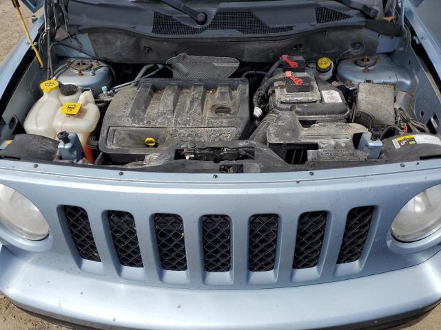 2014 Jeep Liberty (Patriot) VIN 1C4NJRAB3ED517414 Copart auction photo, side / rear end damage thumbnail 12
