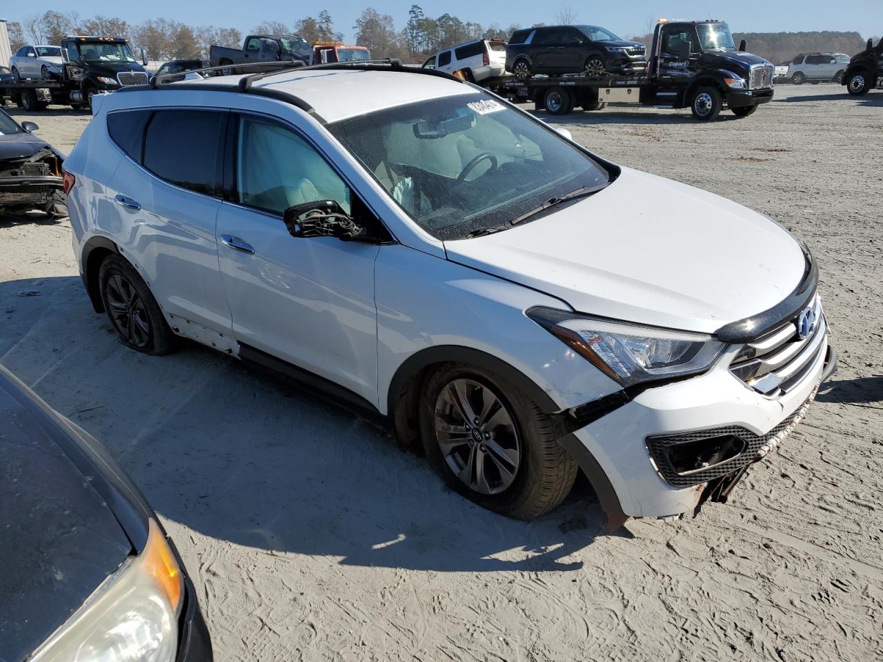 2015 Hyundai Santa Fe VIN 5XYZU3LB4FG284679 Copart auction photo, front end / side damage thumbnail 4