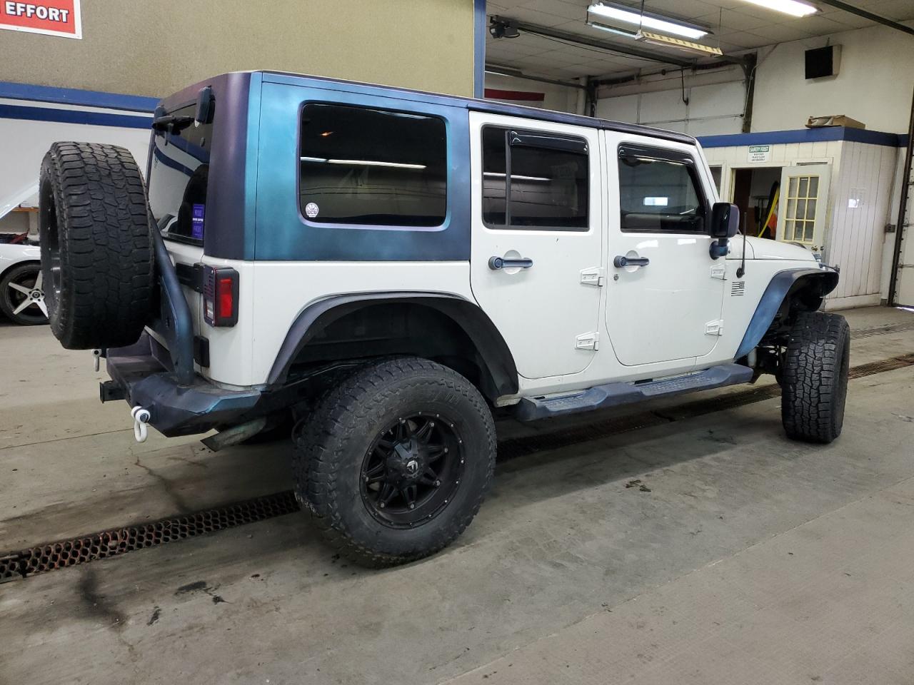 2010 Jeep Wrangler VIN 1J4BA3H17AL119047 Copart auction photo, undercarriage damage thumbnail 3