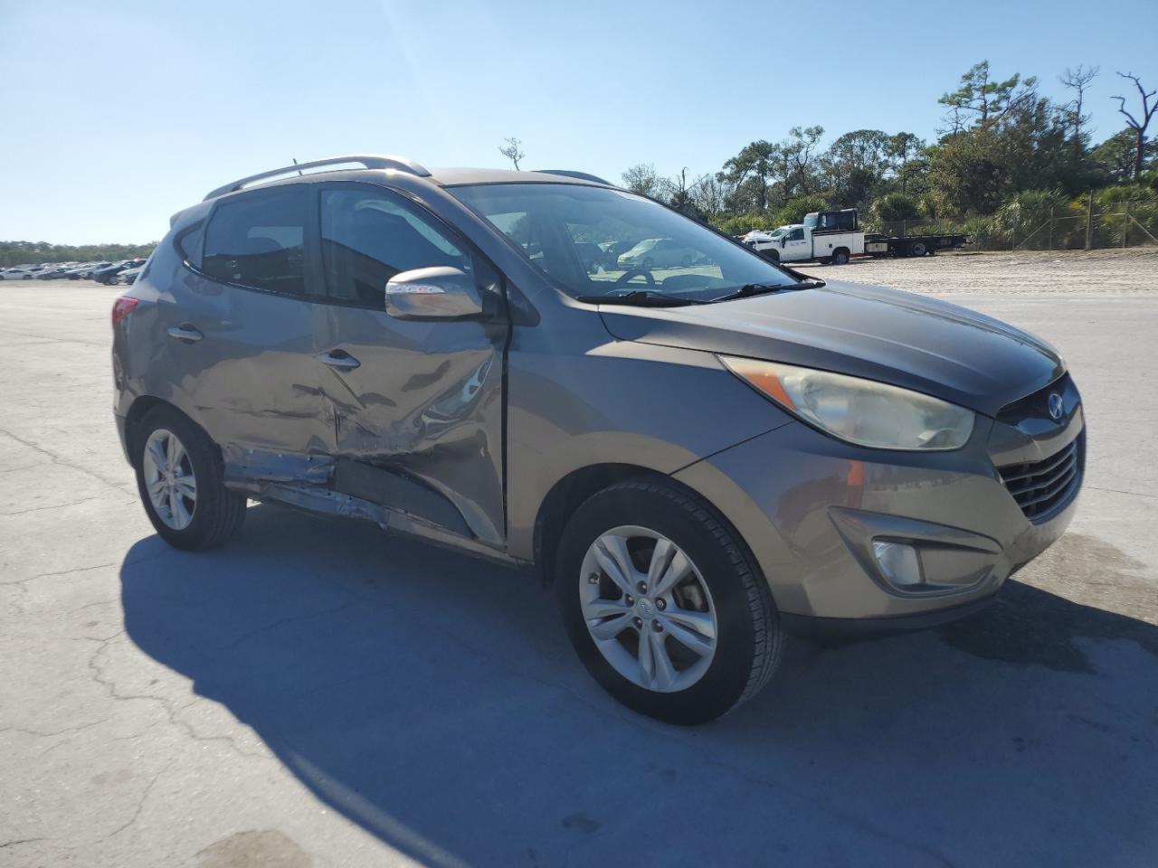 2013 Hyundai Tucson VIN KM8JU3AC8DU651681 Copart auction photo, side / minor dent/scratches damage thumbnail 4