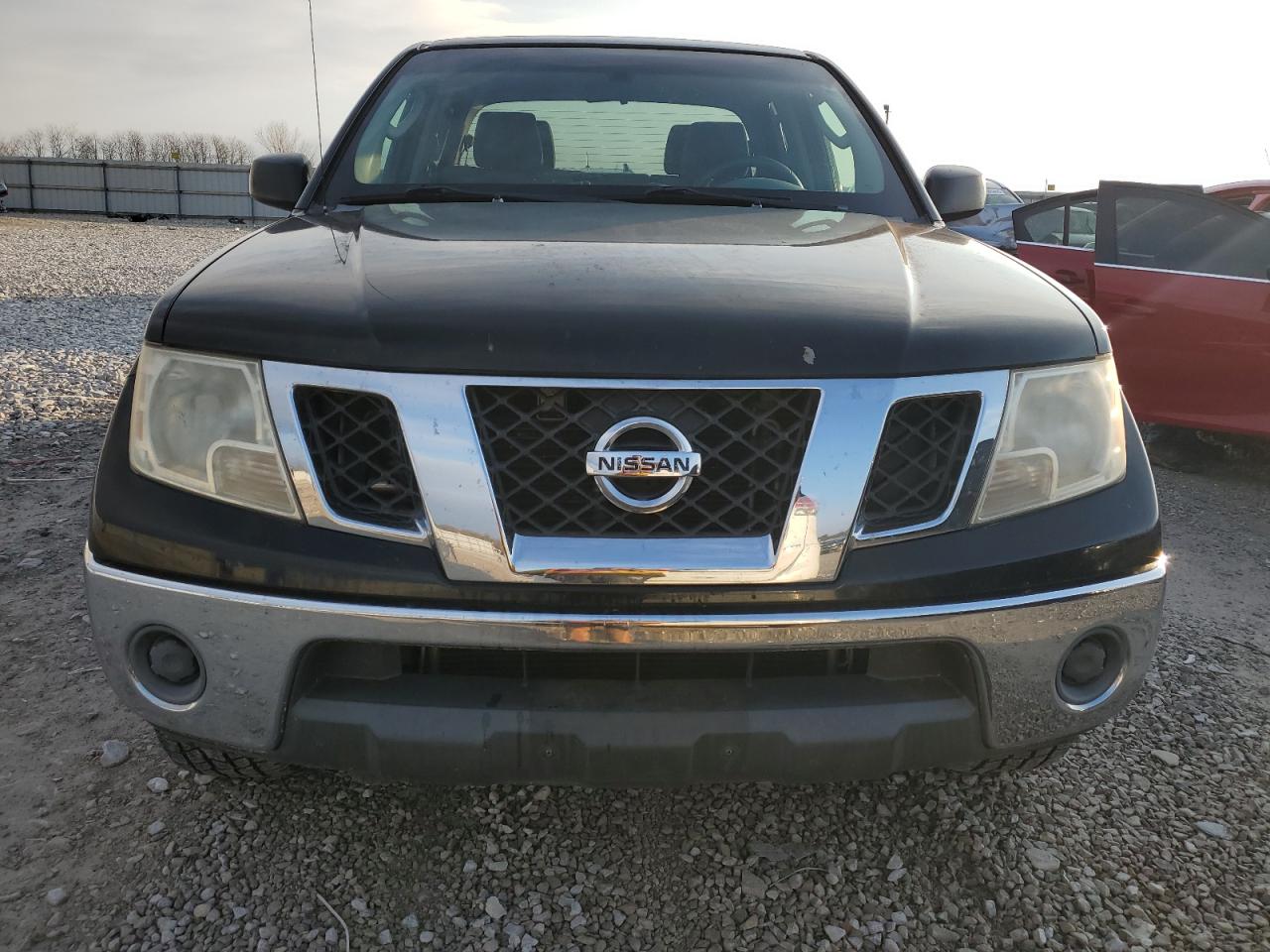 2009 Nissan Navara (Frontier) VIN 1N6AD09W39C420747 Copart auction photo, side / rear end damage thumbnail 5