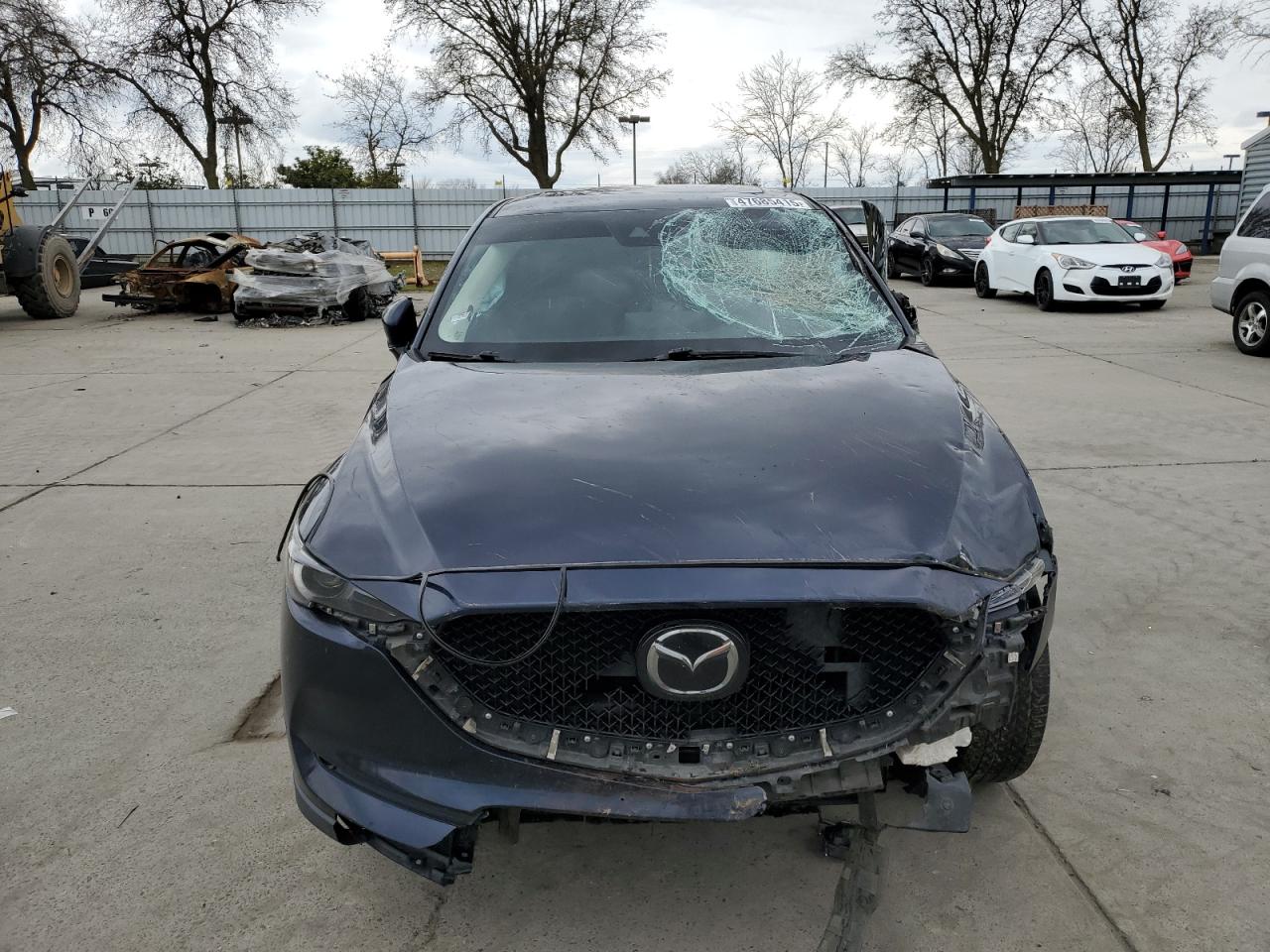 2021 Mazda CX-5 VIN JM3KFADM8M1321415 Copart auction photo, front end / side damage thumbnail 5