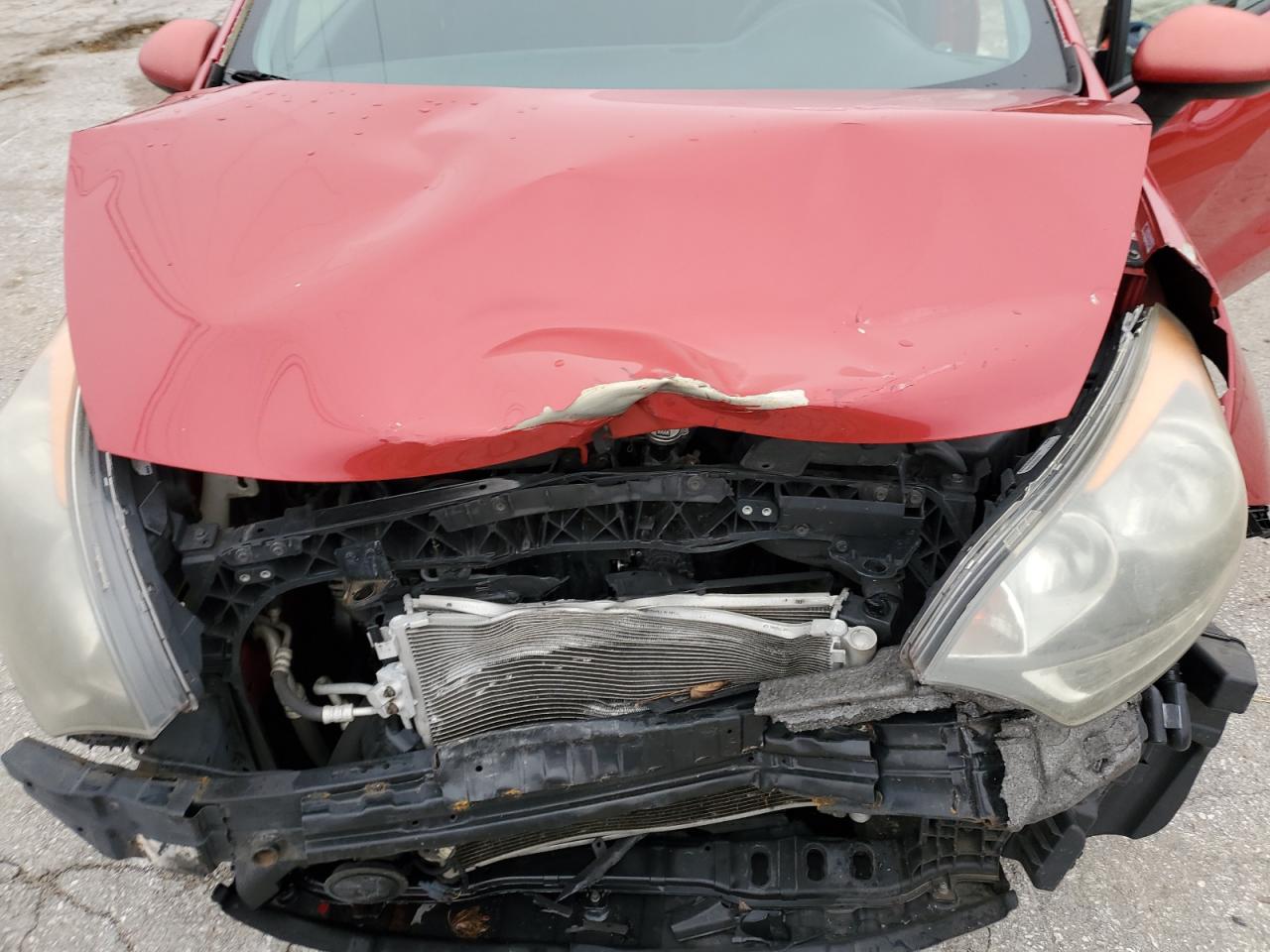 2012 KIA Rio VIN KNADN5A33C6080076 Copart auction photo, front end damage thumbnail 12