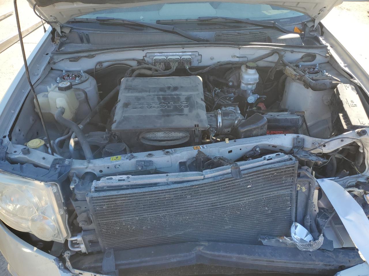 2011 Ford Escape VIN 1FMCU9EG4BKC51697 Copart auction photo, front end / damage history damage thumbnail 12