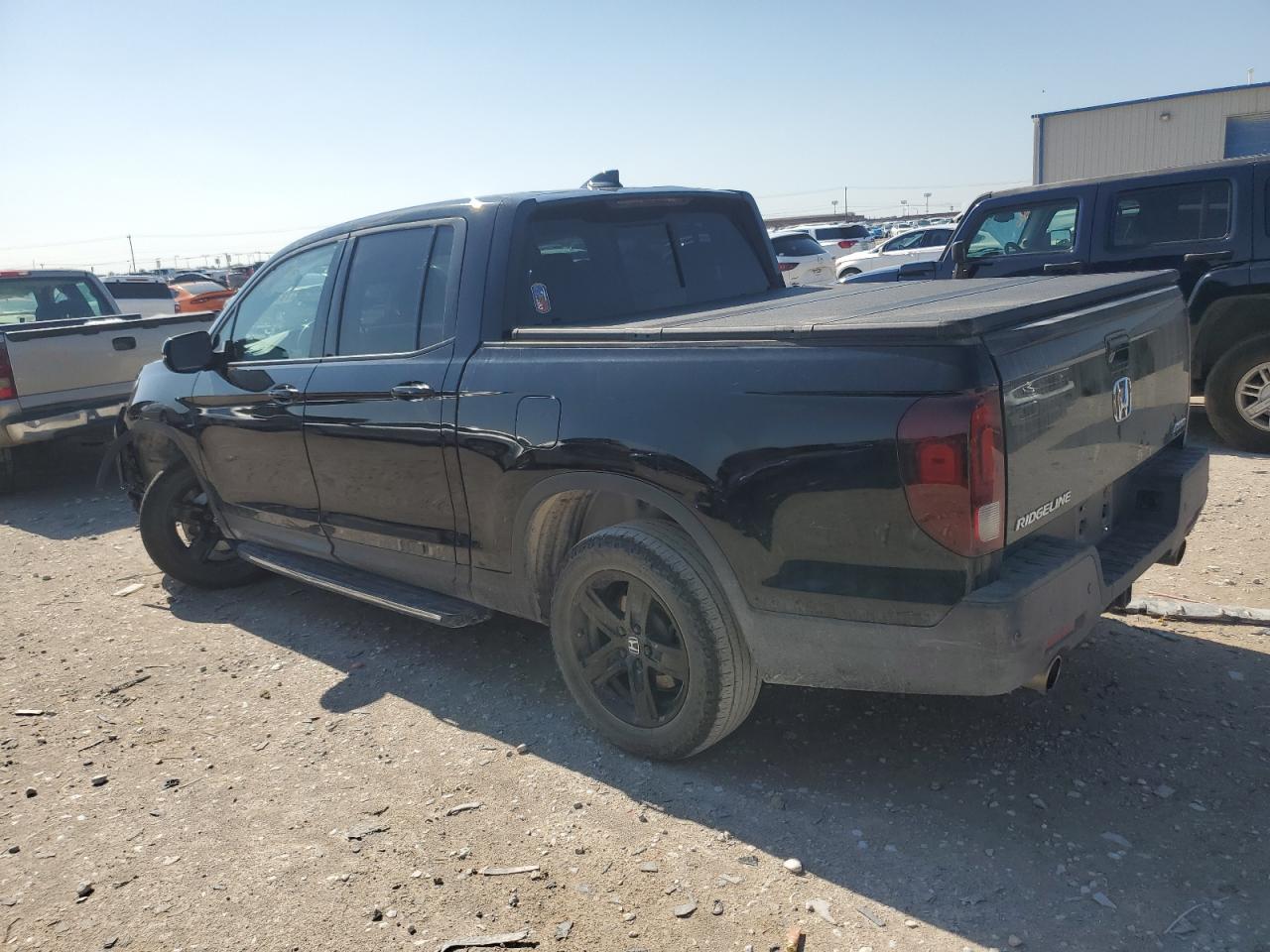 2022 Honda Ridgeline VIN 5FPYK3F83NB039533 Copart auction photo, front end / top/roof damage thumbnail 2