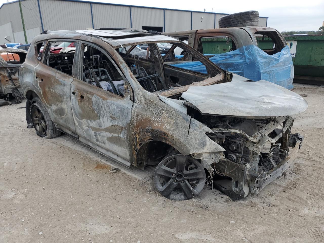2015 Toyota RAV 4 VIN JTMWFREV9FD072575 Copart auction photo, burn damage thumbnail 4