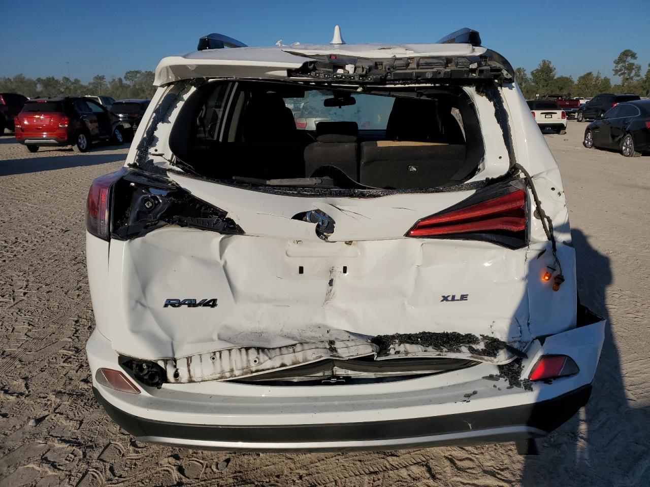 2018 Toyota RAV 4 VIN JTMWFREV7JD109082 Copart auction photo, rear end damage thumbnail 6