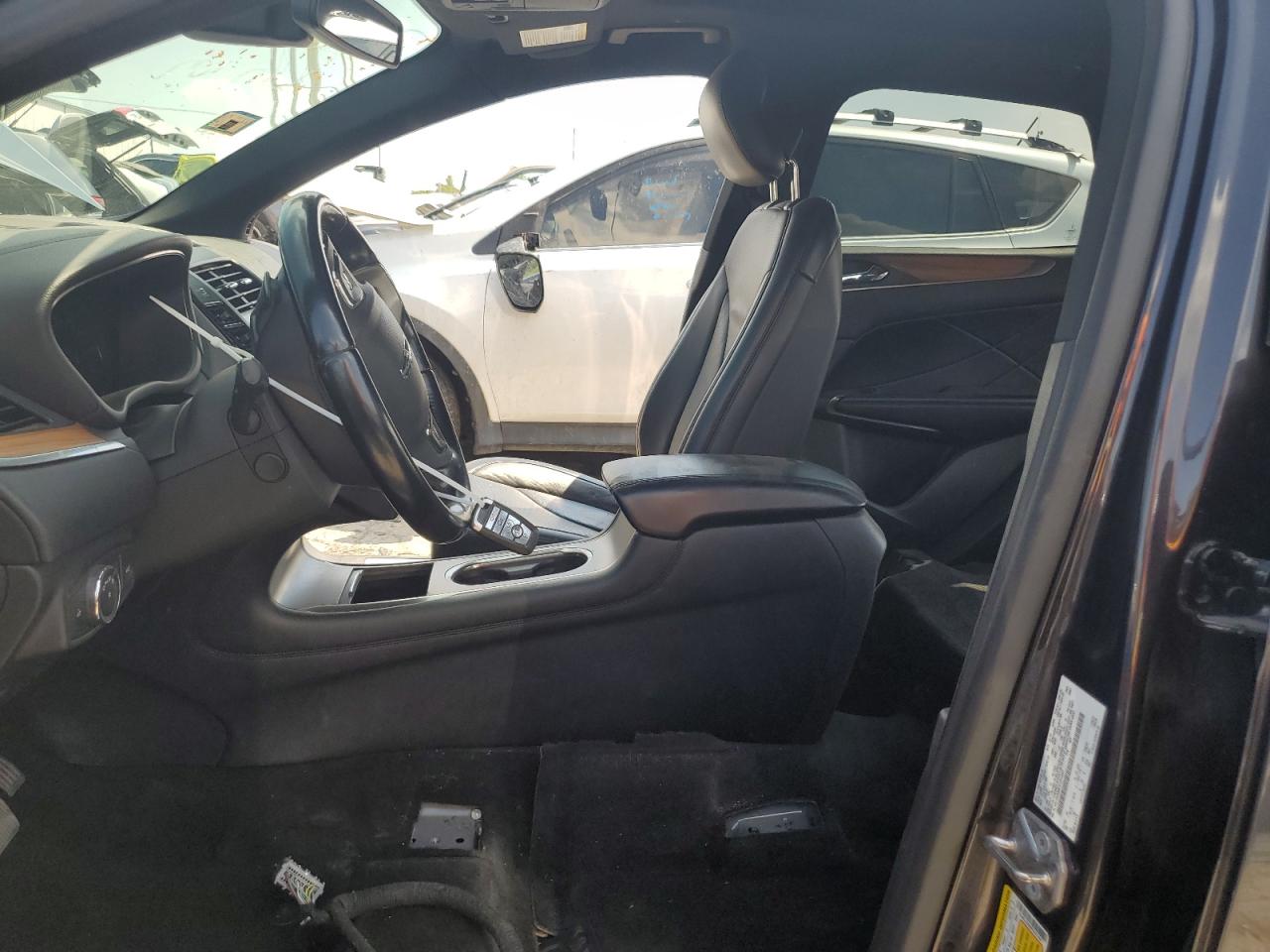 2015 Lincoln MKZ VIN 5LMCJ2A99FUJ31487 Copart auction photo, stripped damage thumbnail 7