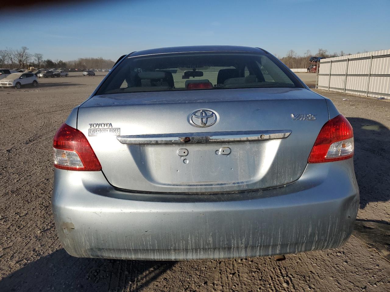 2010 Toyota Yaris VIN JTDBT4K30A1395467 Copart auction photo, side damage thumbnail 6