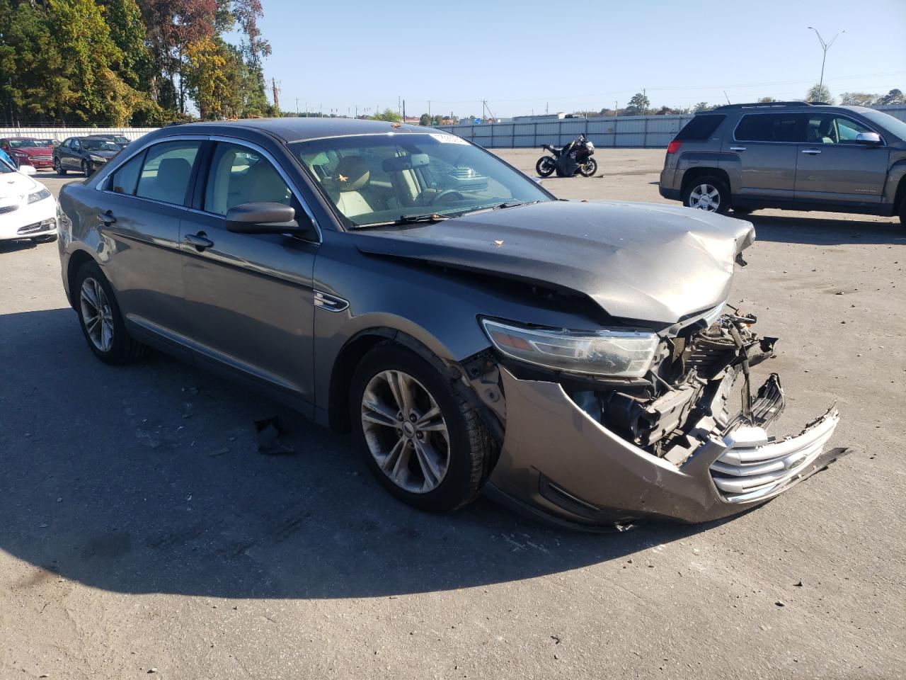 2014 Ford Taurus VIN 1FAHP2E8XEG144040 Copart auction photo, front end damage thumbnail 4