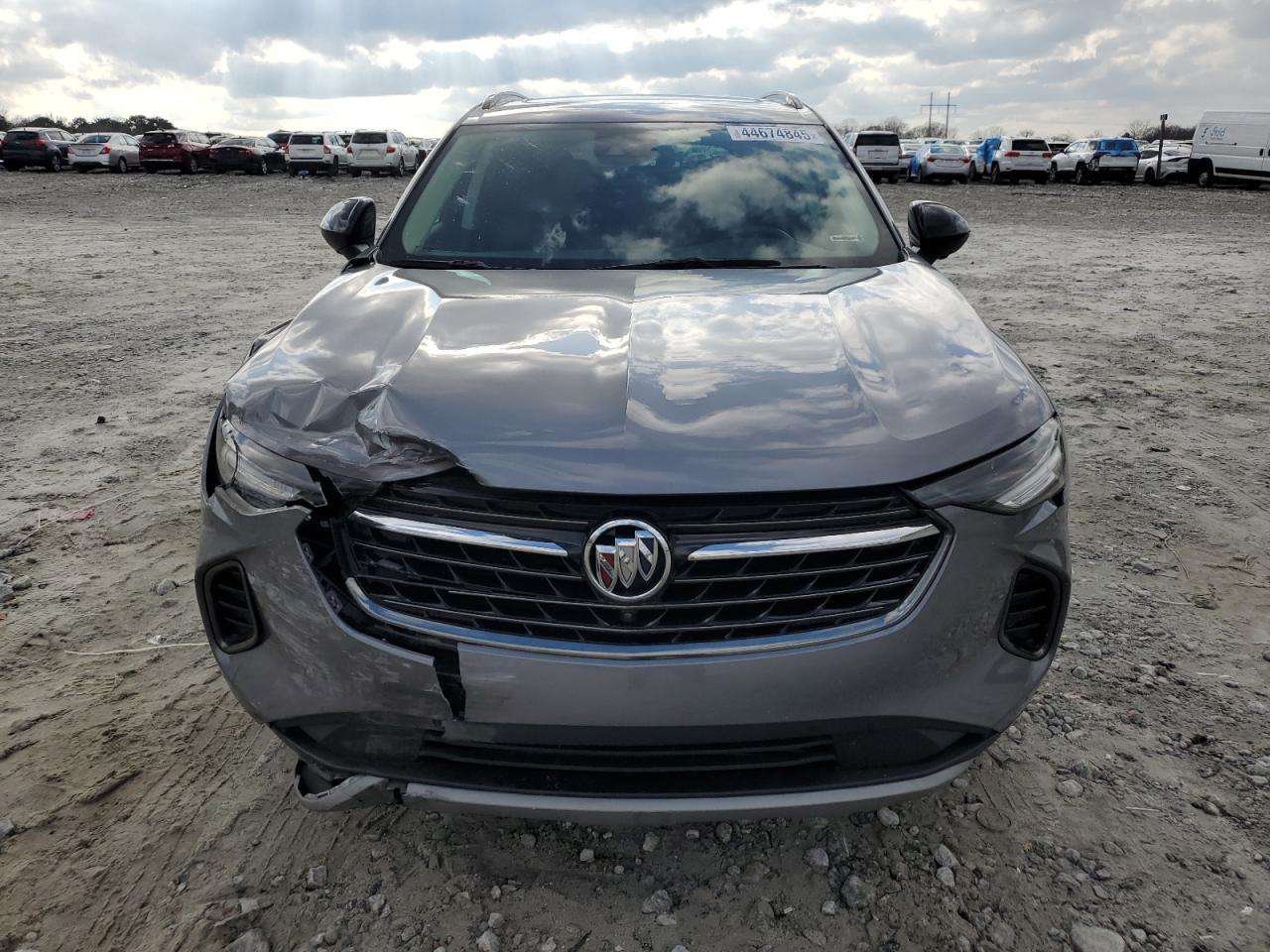2021 Buick Envision VIN LRBFZNR49MD167344 Copart auction photo, front end / side damage thumbnail 5