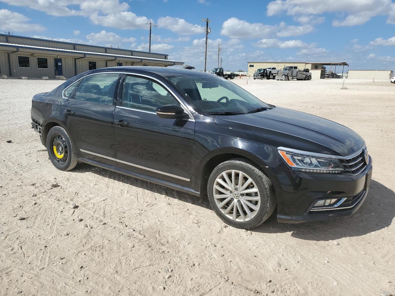 2017 Volkswagen Passat VIN 1VWBT7A34HC027517 Copart auction photo, rear end damage thumbnail 4