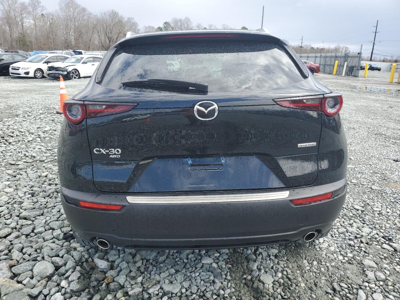 2023 Mazda CX-30 VIN 3MVDMBCM0PM580114 Copart auction photo, front end damage thumbnail 6