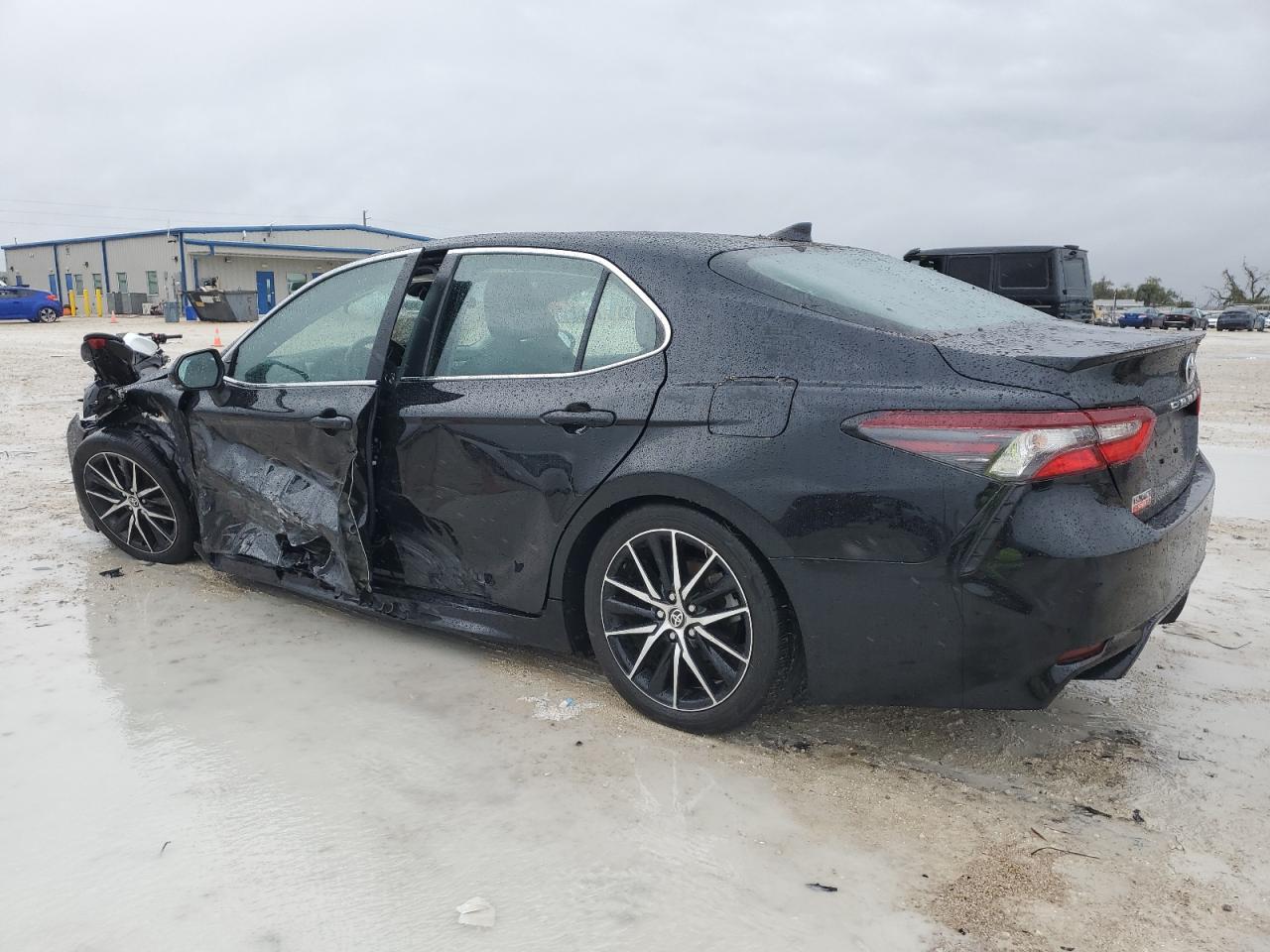 2023 Toyota Camry VIN 4T1G11AKXPU787748 Copart auction photo, side / front end damage thumbnail 2