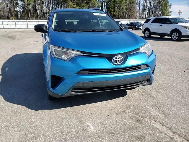 2016 Toyota RAV 4 VIN JTMZFREV6GD091857 Copart auction photo, rear end damage thumbnail 12